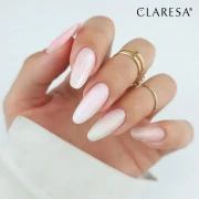 Claresa żel budujący hard &amp; easy gel uv/led "Glam Pink" 45g. Żel pokazany na stylizacji manicure, przedłużone paznokcie w kształcie migdał. Białe tło oraz tego samego koloru rękaw.