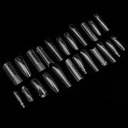 Clavier dual form tip mix. Formy do przedłużania paznokci. 288 sztuk. Różne kształty dual form poza opakowaniem na czarnym tle.